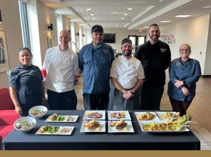 People First Culture. Parkhurst Dining team showing off delicious food.