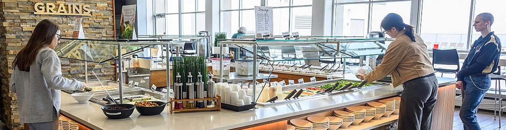 Guests prepare their plates at one of Parkhurst's nutrition based buffets.
